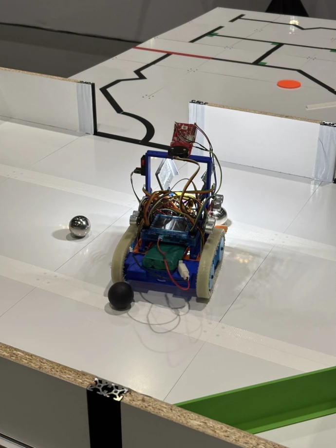 A robot in the "Evacuation Zone" of a RoboCupJunior field